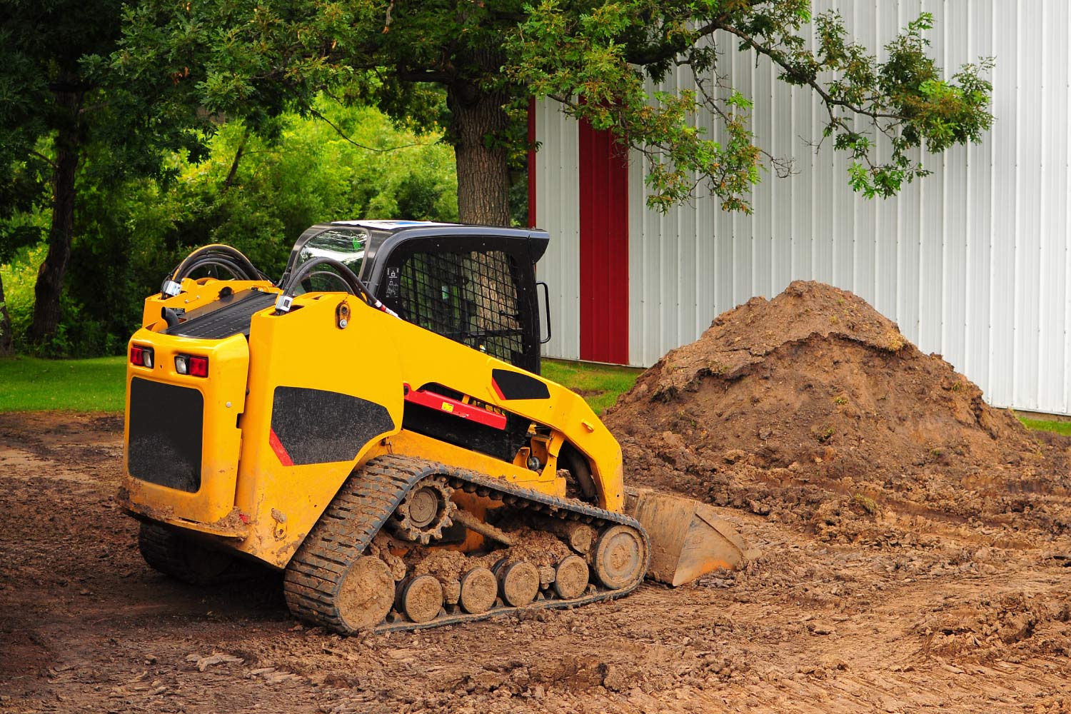 stationary compact track loader on a job site